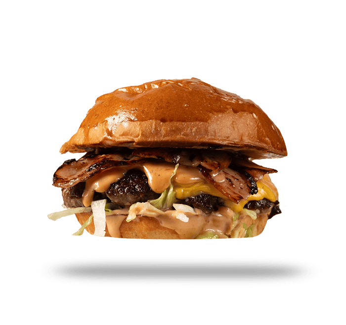 Κλασικό cheeseburger με λιωμένο τυρί και τραγανό ψωμάκι